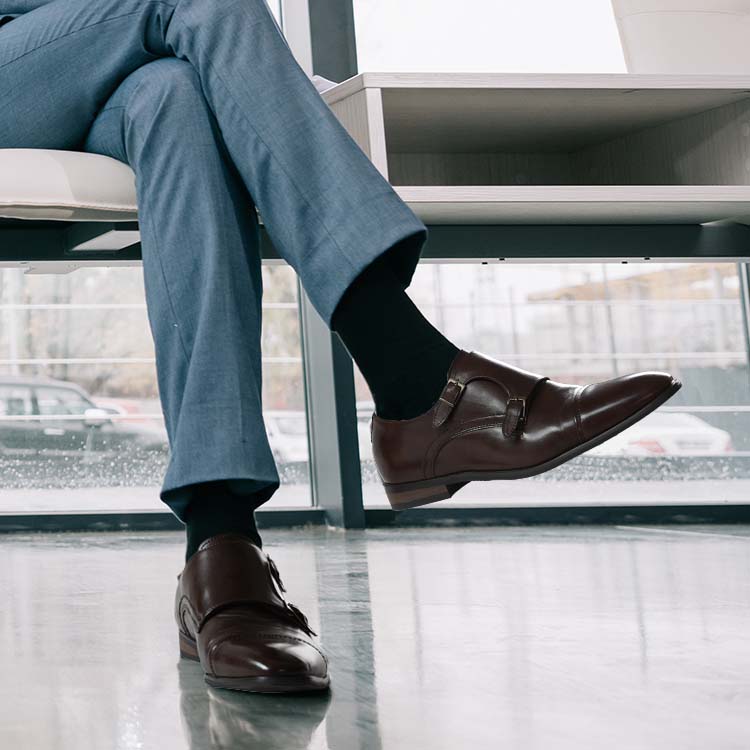 Navy trousers and fashion black shoes