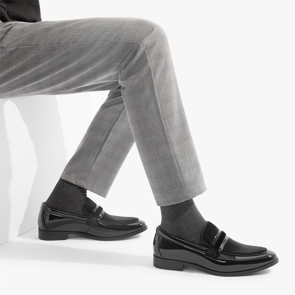 Black dress shoes with orders grey pants